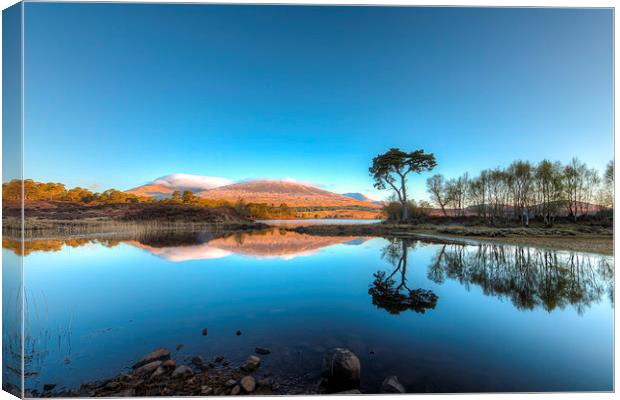 Serene Sunrise over Loch Tulla Canvas Print by Tommy Dickson