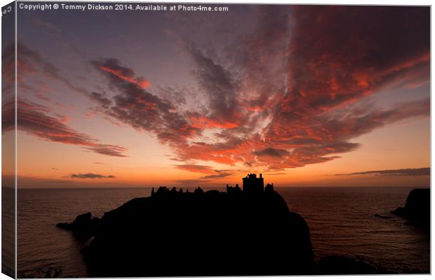 Epic sky over Dunnottar Castle Canvas Print by Tommy Dickson