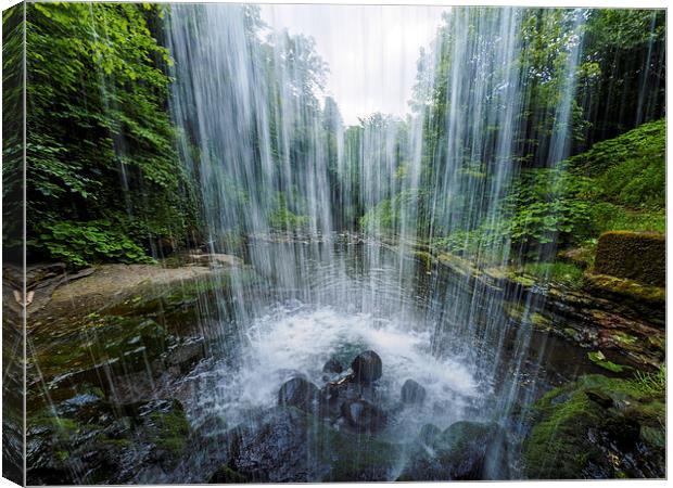  Under the waterfall. Canvas Print by Tommy Dickson