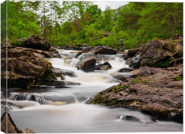 Falls of Dochart, Killin. Canvas Print by Tommy Dickson