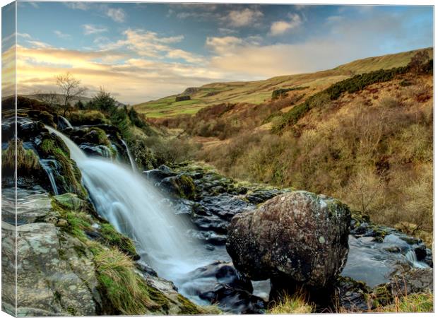 Loup of Fintry waterfall in Central Scotland. Canvas Print by Tommy Dickson