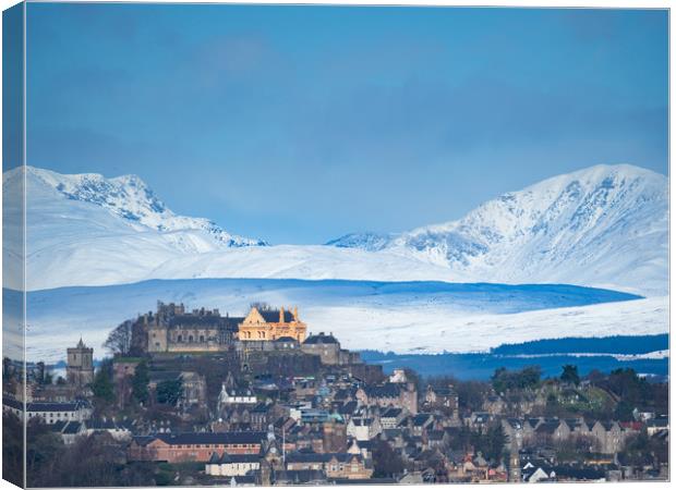 City of Stirling with snow covered Stuc a Chroin a Canvas Print by Tommy Dickson