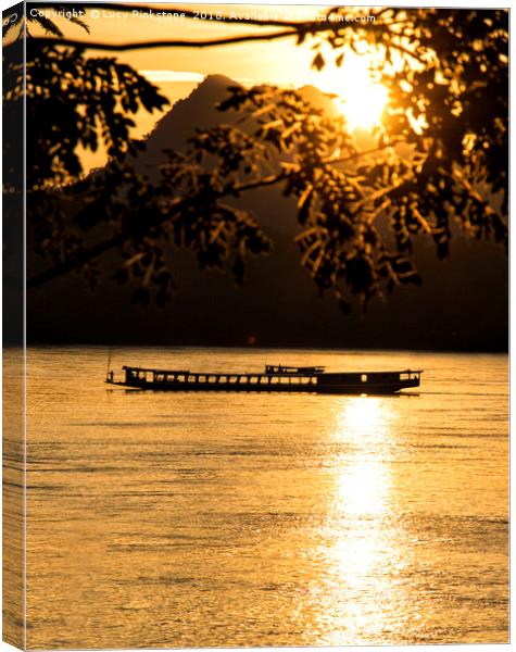 Sunset over the Mekong River Canvas Print by Lucy Pinkstone