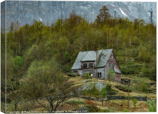 Norwegian wooden house on a mountain above Flaam Canvas Print by Paul Nicholas