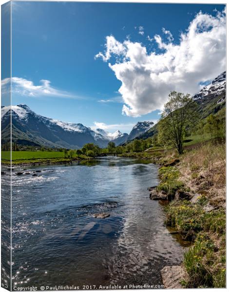 Oldeelva river on the edge of Olden in Norway Canvas Print by Paul Nicholas