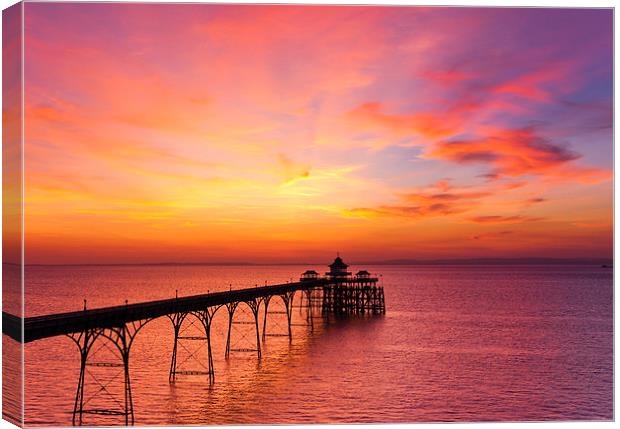 Clevedon Pier, UK, Sunset colours Canvas Print by Daugirdas Racys