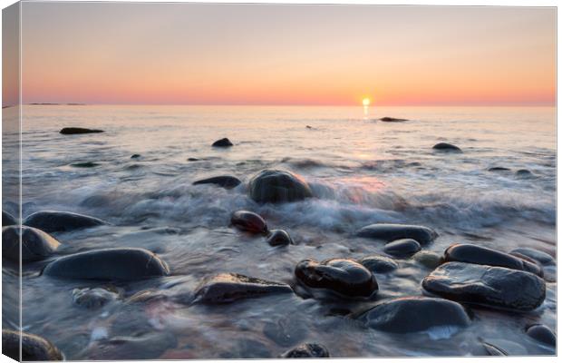 Sunrise at Embleton bay, Northumberland Canvas Print by Daugirdas Racys