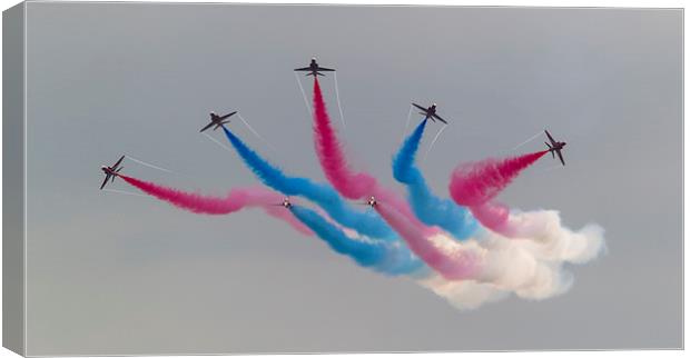 Red Arrows and coloured smoke Canvas Print by Kenneth Dear