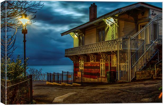 Chalet by the Sea Canvas Print by Cliff Miller