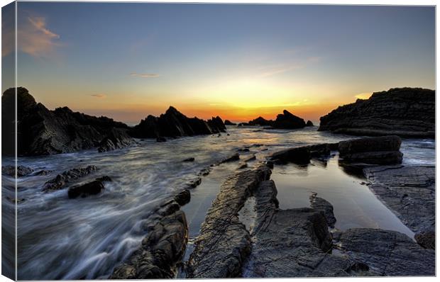 Serene Sunset at Hartland Quay Canvas Print by Mike Gorton