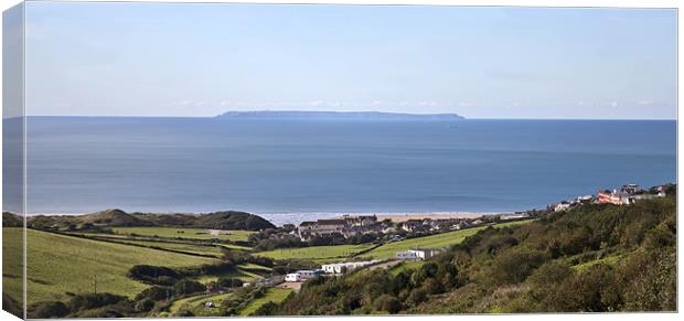 Lundy Over Woolacombe Canvas Print by Mike Gorton