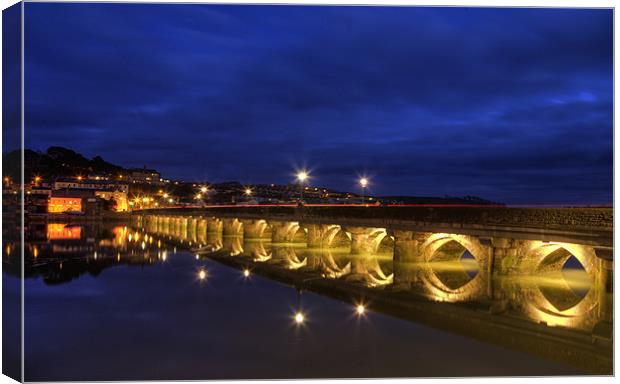 Golden Lights over Bideford Long Bridge Canvas Print by Mike Gorton