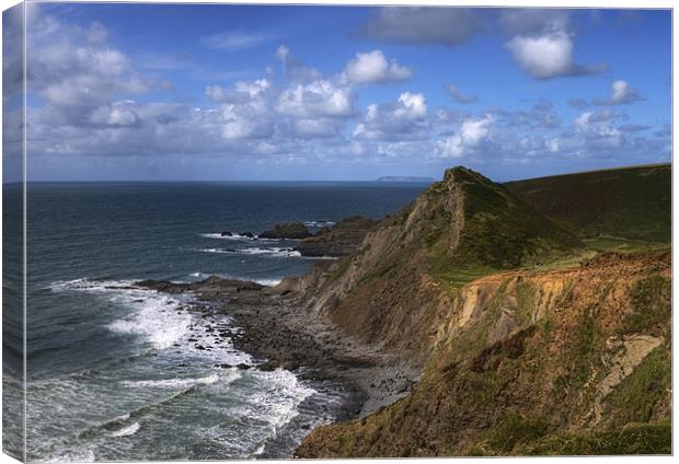 Hartland Quay with Lundy in the distance Canvas Print by Mike Gorton