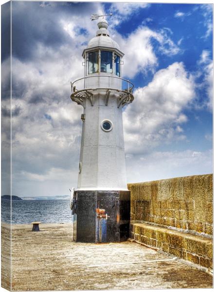 Mevagissey outer harbour Lighthouse Cornwall Canvas Print by Mike Gorton