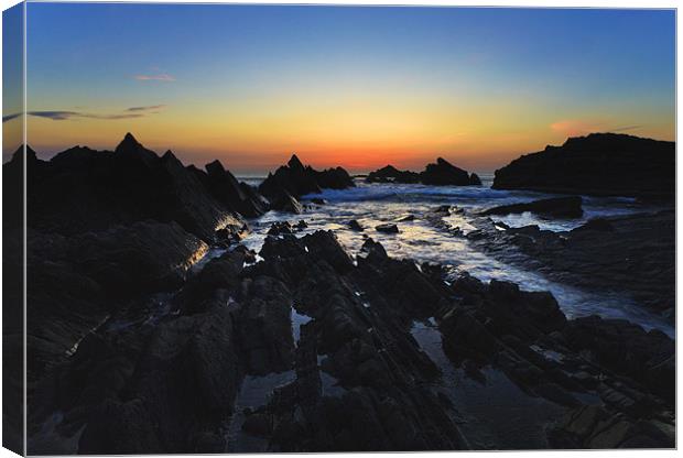 Sunset Over Hartland Quay Canvas Print by Mike Gorton