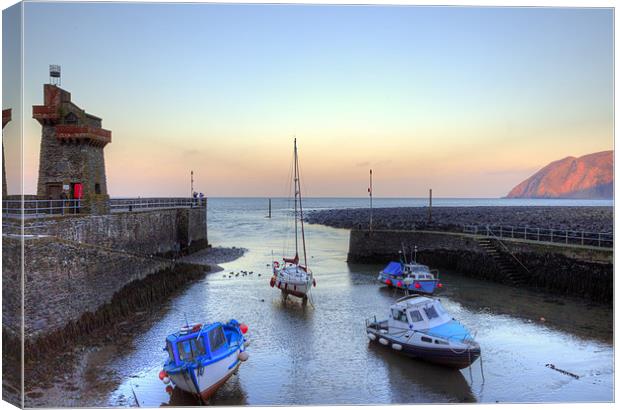 Lynmouth Harbour Sunset Canvas Print by Mike Gorton