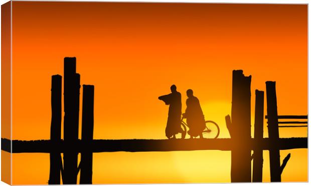 U Bein bridge and people at sunset Canvas Print by Guido Parmiggiani