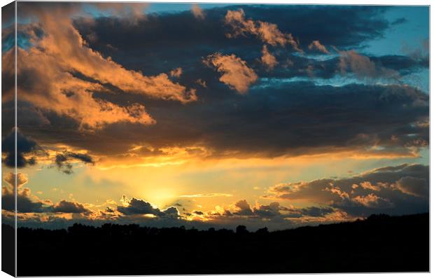 Cloudy Sunset Canvas Print by Marco Buresti