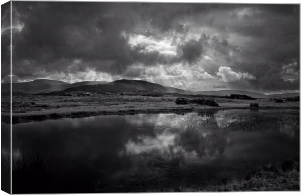  Storm clouds over Brecon Beacons Canvas Print by Ceri Jones