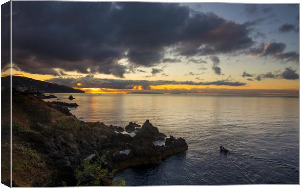 Sunrise over Funchal Canvas Print by Ceri Jones