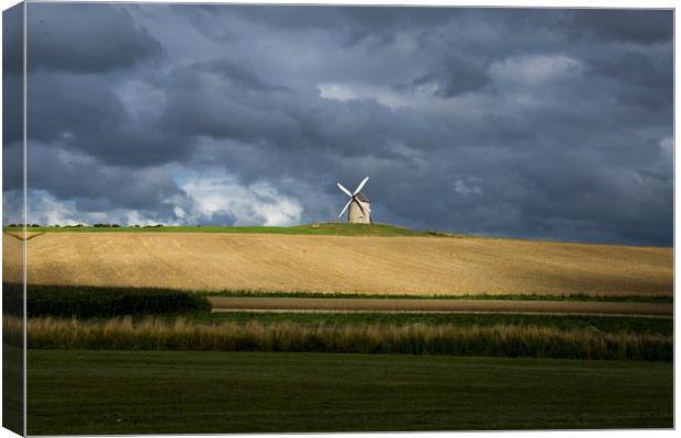 windmill on a stormy day Canvas Print by Eric Fouwels
