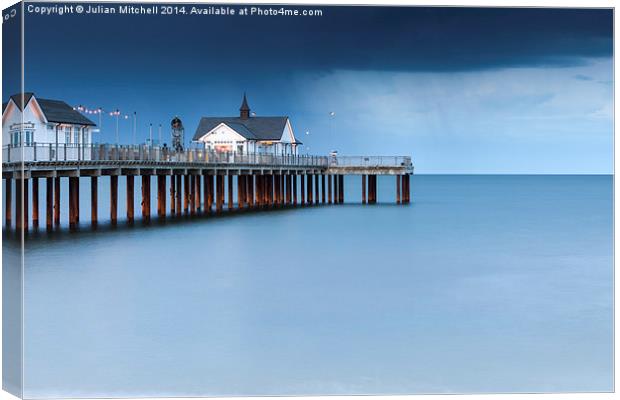 Storm over Southwold Pier Canvas Print by Julian Mitchell