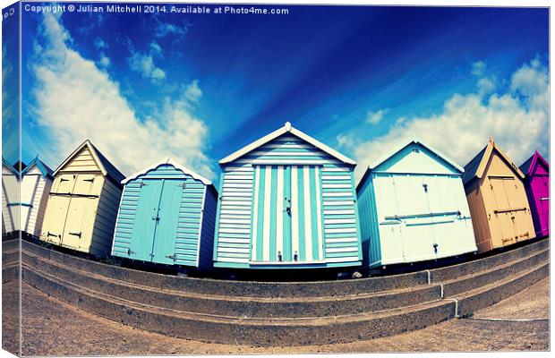 Felixstowe Beach huts Canvas Print by Julian Mitchell