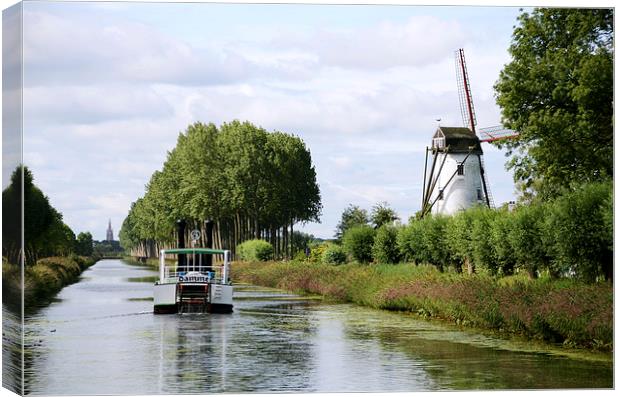 Boat Back to Bruges Canvas Print by Carolyn Eaton