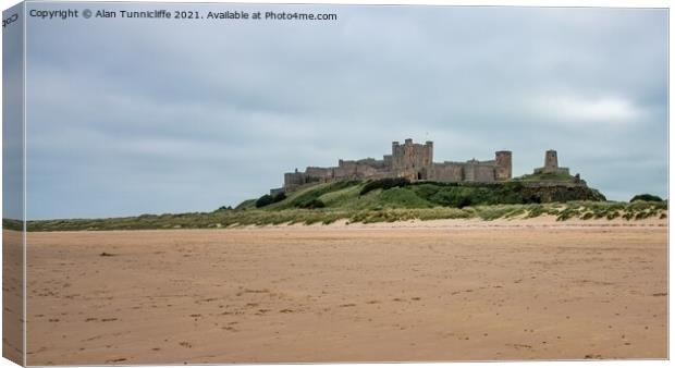 Bamburgh Castle Canvas Print by Alan Tunnicliffe