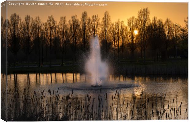 Serene Sunset Reflections Canvas Print by Alan Tunnicliffe