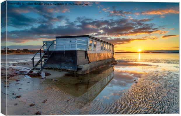 Stunning sunset over an old houseboat moored at Bramble Bush Bay Canvas Print by Helen Hotson