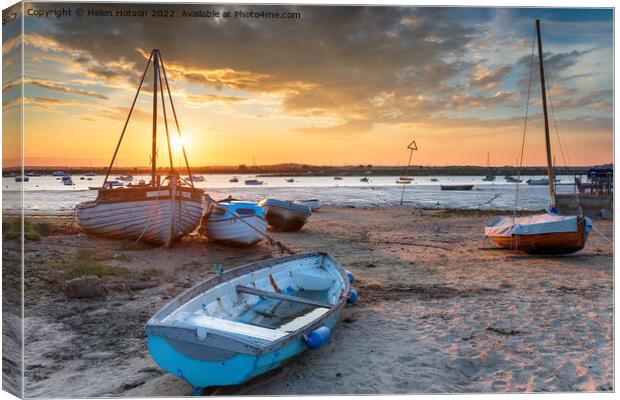 Beautiful sunset over boats on the beach at West Mersea, Canvas Print by Helen Hotson