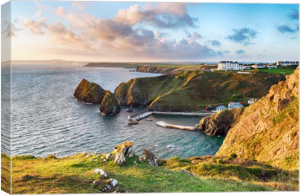 Mullion Cove in Cornwall Canvas Print by Helen Hotson