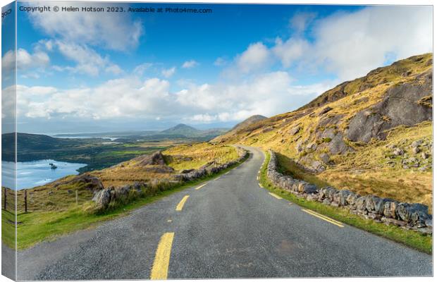 The single track road winding through the Healy Pass Canvas Print by Helen Hotson