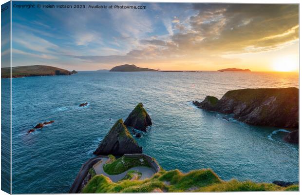 Sunset over Dunquin Pier near Dingle  Canvas Print by Helen Hotson