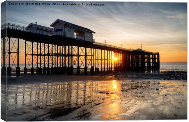 Sunrise at Penarth Pier in Wales Canvas Print by Helen Hotson