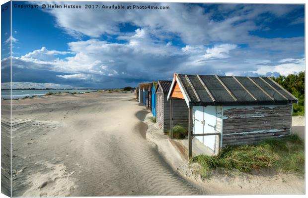 Pretty Beach Huts in Sussex Canvas Print by Helen Hotson