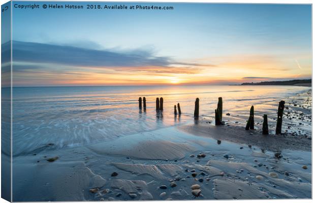 Sunrise at Sandsend Beach in Yorkshire Canvas Print by Helen Hotson