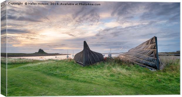 Boathouses at Lindisfarne Canvas Print by Helen Hotson