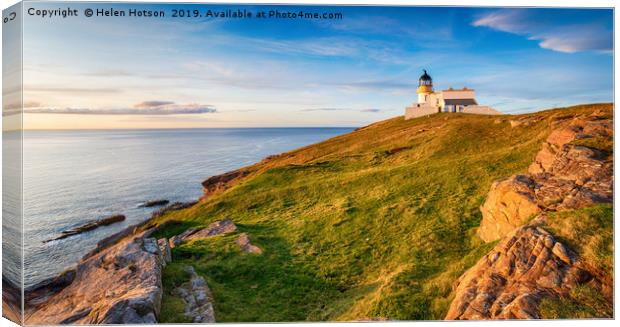 Evening sunshine on the lighthouse at Stoer Head Canvas Print by Helen Hotson