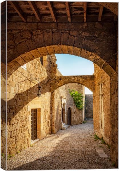 Rhodes Street of the Knights Alley Canvas Print by Antony McAulay