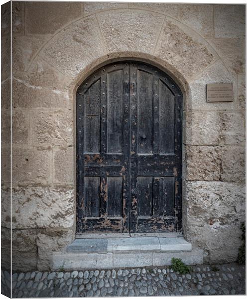 Rhodes Street of the Knights Door to Ministry of Culture Canvas Print by Antony McAulay