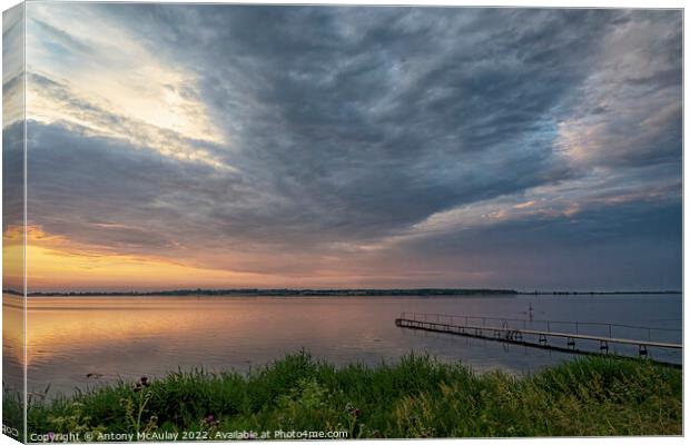 Faro Island Sunset Canvas Print by Antony McAulay