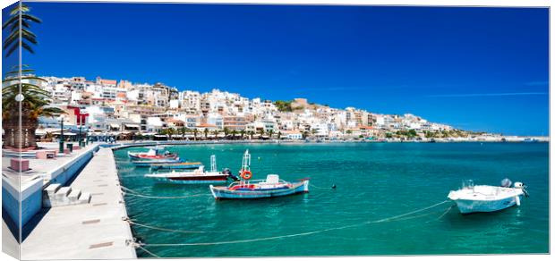 Sitia Seafront with boats Canvas Print by Antony McAulay