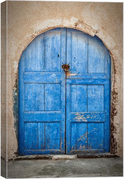 Santorini Blue Door Canvas Print by Antony McAulay