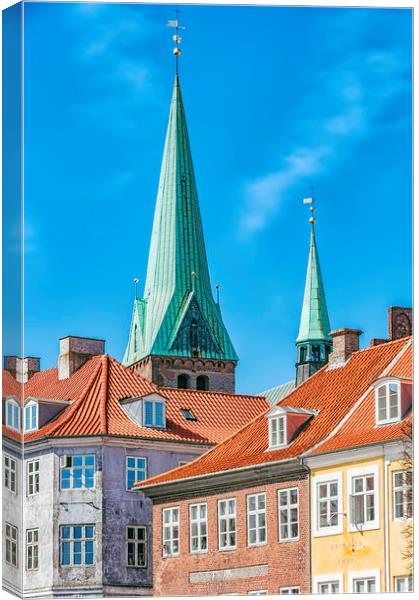 Helsingor Church Behind Buildings Canvas Print by Antony McAulay