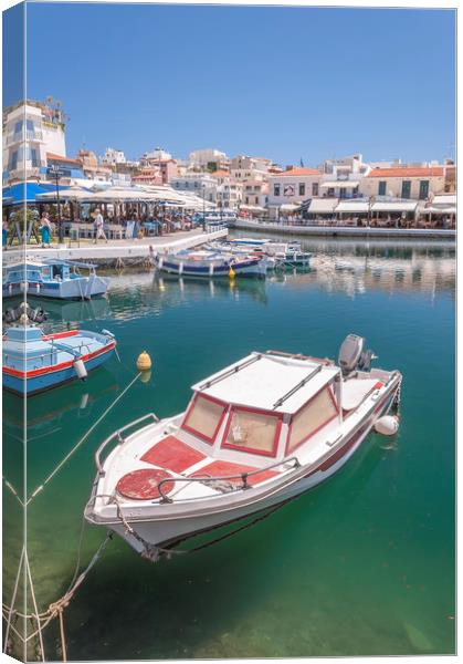 Agios Nikolaos Boat in Lagoon Canvas Print by Antony McAulay