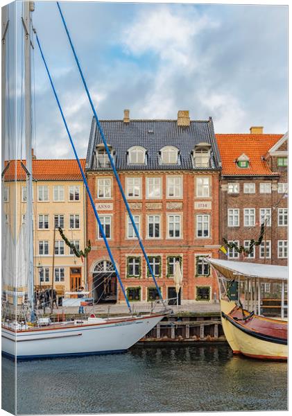 Copenhagen Nyhavn Waterfront Facade Canvas Print by Antony McAulay