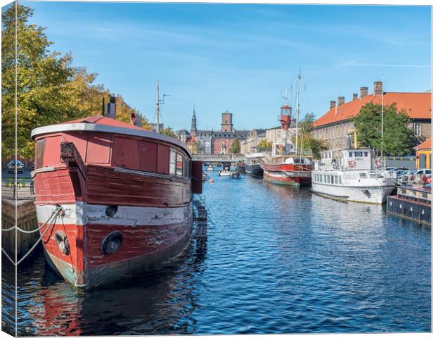 Copenhagen Canal Scene with Red Barge Canvas Print by Antony McAulay