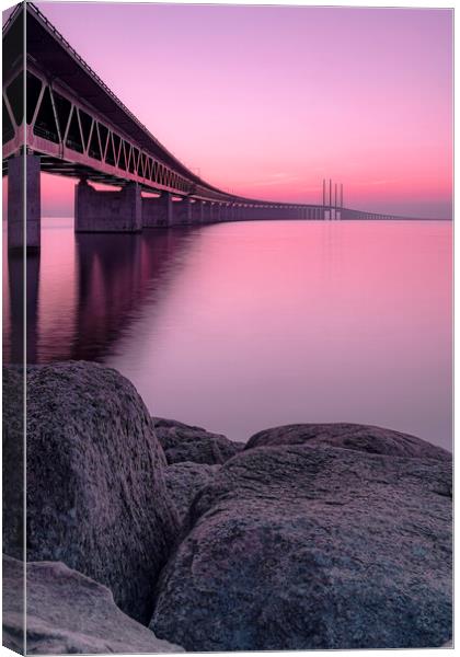 Oresunds Bridge at Pink Sunset  Canvas Print by Antony McAulay